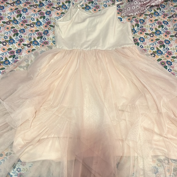 The dress has been warned twice it was made by zenzi it’s pink and white - Picture 3 of 3